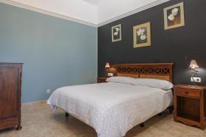 Ein Bett oder Betten in einem Zimmer der Unterkunft Casa Maria Granillo