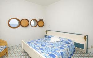 Postel nebo postele na pokoji v ubytování Villa Azzurra + 28 fotografií