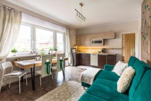 Kuchyňa alebo kuchynka v ubytovaní Apartamenty Deja Vu Zakopane