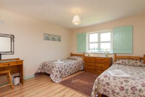 Letto o letti in una camera di Kilmore Cottages Self - Catering