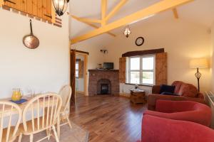 Area soggiorno di Kilmore Cottages Self - Catering