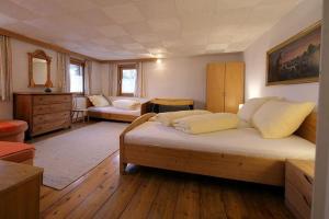 Postel nebo postele na pokoji v ubytování Ferienhaus Thoma + 5 fotografií
