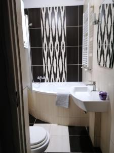 Et badeværelse på apartament eurotrader321