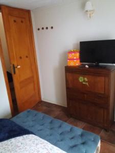 TV a/nebo společenská místnost v ubytování Casa Bermeja
