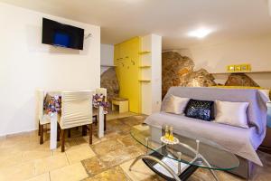 TV a/nebo společenská místnost v ubytování Room M