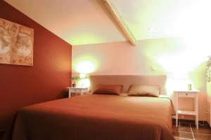 Säng eller sängar i ett rum på Vakantieverblijf Alfzotmolen