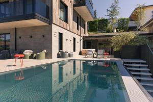 The swimming pool at or close to GOING TRIPLE A apartments EAST