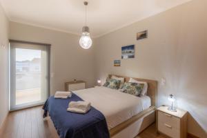 Postel nebo postele na pokoji v ubytování Apartamento 7 Mares + 37 fotografií