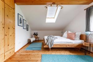 A bed or beds in a room at Ferienwohnung am Bründlweg