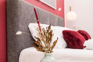 Tempat tidur dalam kamar di Mint@Naschmarkt Premium Apartments