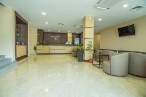 a lobby of a hospital with a waiting room at Hotel Magnific in Kranevo