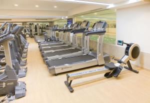 a gym with a row of tread machines at Hurry Inn Merter Istanbul in Istanbul