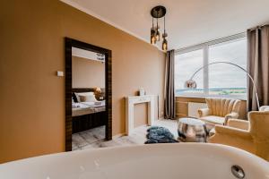 Łóżko lub łóżka w pokoju w obiekcie Hotel Palcát