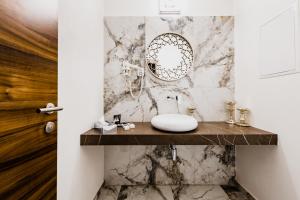 Łazienka w obiekcie Hotel Palcát