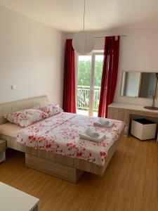 Postel nebo postele na pokoji v ubytování Apartmani Nada