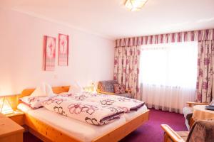 Postel nebo postele na pokoji v ubytování Haus Iris