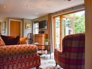 Televiisor ja/või meelelahutuskeskus majutusasutuses Yew Tree