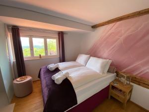 Postel nebo postele na pokoji v ubytování Espace Entre Ciel & Terre