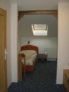 Posteľ alebo postele v izbe v ubytovaní Hotel Maria