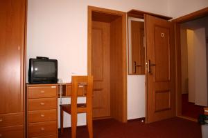 Kuchyňa alebo kuchynka v ubytovaní Hotel Maria