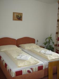 Posteľ alebo postele v izbe v ubytovaní Hotel Maria