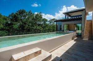 Hồ bơi trong/gần Fairmont Heritage Place Mayakoba