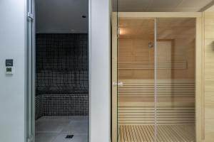 Kúpeľňa v ubytovaní Mossa Well Being Hotel