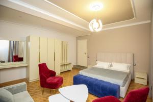 Postel nebo postele na pokoji v ubytování Hotel Vila Stefa
