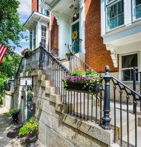 a stairway in front of a house with flowers at Christopher Dodge House in Providence