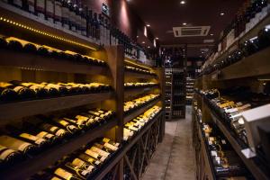 a store filled with lots of wine bottles at Royal Boutique Savassi Hotel in Belo Horizonte