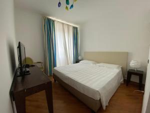 Postel nebo postele na pokoji v ubytování Hotel Joseph