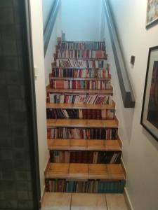 a stair case full of dvds at Cath's place in Toulon