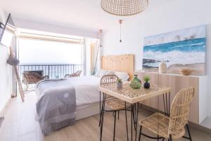 Postel nebo postele na pokoji v ubytování Vanilla Beach Boutique Studio