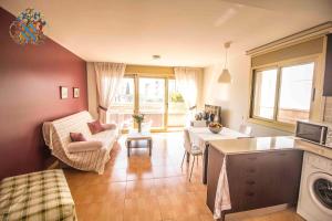 a living room with a couch and a table at Hotel Victoria Spa & Splay Center in Segur de Calafell
