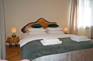 Posteľ alebo postele v izbe v ubytovaní Apartament Pisz Centrum 7