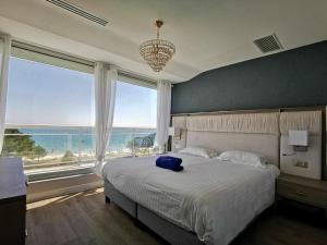Le Diana Hôtel & Spa客房内的一张或多张床位