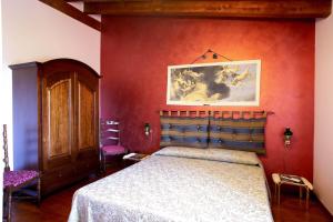 A bed or beds in a room at Casa Vacanze 4 Pileri