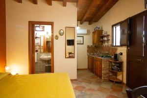 A kitchen or kitchenette at Casa Vacanze 4 Pileri