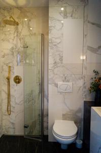 Kúpeľňa v ubytovaní Apartament Pisz Centrum 7