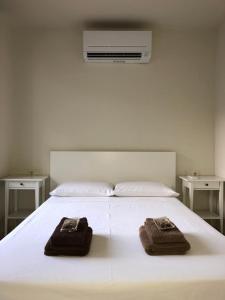A bed or beds in a room at Calella Playa Vistas Mar