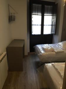 Posteľ alebo postele v izbe v ubytovaní Casa Tato Figuerola d'Orcau