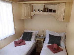 Postel nebo postele na pokoji v ubytování Ubytování u Okoře