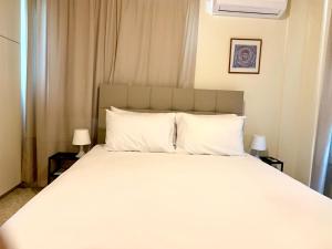 Кровать или кровати в номере Himonas Apartments
