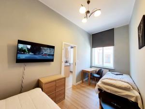 Postel nebo postele na pokoji v ubytování Apartament Kleopatra