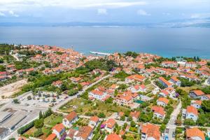 an aerial view of a city with houses and the ocean at CITY VIEW APARTMENT in Sutivan
