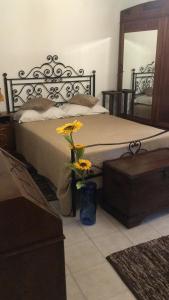 A bed or beds in a room at Affittacamere Mirella