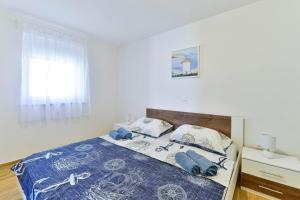 Posteľ alebo postele v izbe v ubytovaní Apartman Duje 2