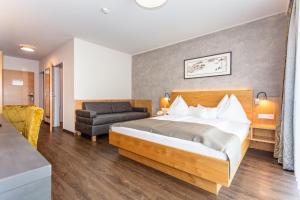 Katil atau katil-katil dalam bilik di Hotel Almrausch