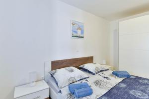 Posteľ alebo postele v izbe v ubytovaní Apartman Duje 2