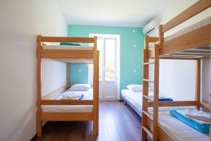 Hostel Trobenta in Oblak客房内的一张或多张床位